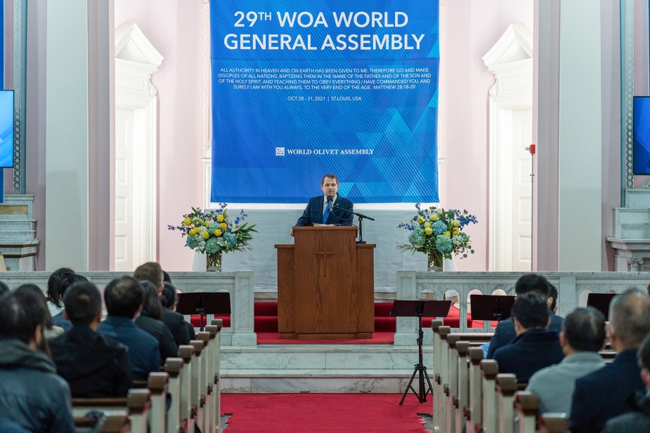 Pastor Mark Spisak delivers the sermon for the opening service of the 29th WOA World General Assembly